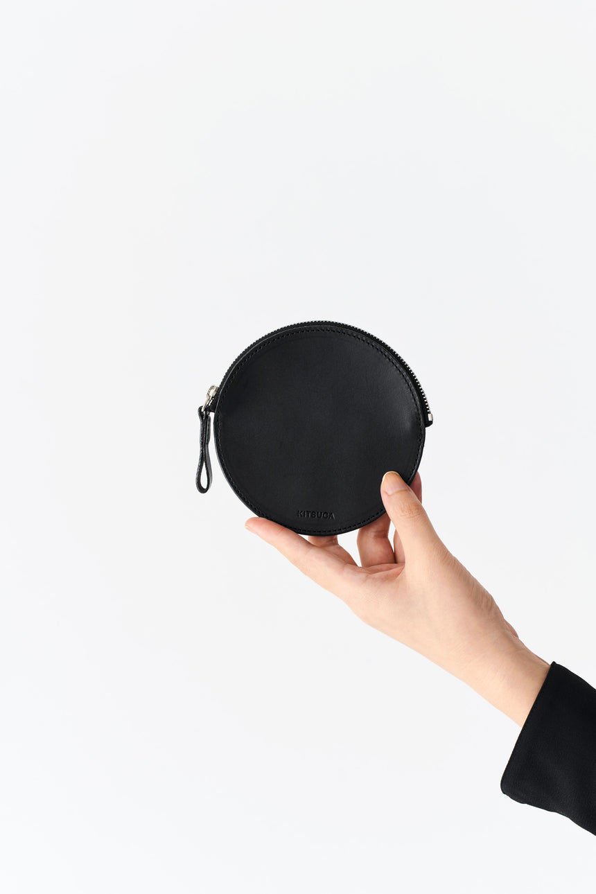 シンプルな丸型の革製コインケース(ミニ財布)